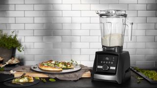 vitamix ascent A3500 blender next to a pizza